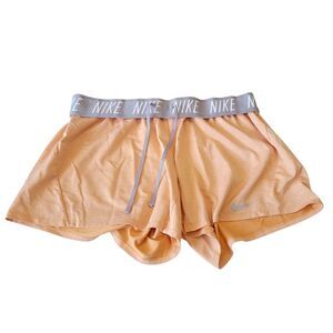 Nike fold down dri-fit training shorts Size Medium in peach orange women